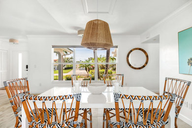 This is an example of a beach style dining room in New York.