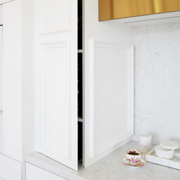 Sleek, White, Quartz-Embellished Kitchen