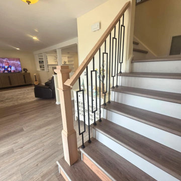 Indoor Railing Installation with Red Oak T-Rail, Box Newels & Black Window Balus