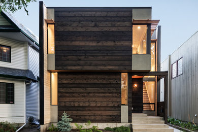 Example of a minimalist exterior home design in Edmonton