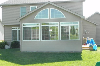 Craftsman beige exterior home idea in Indianapolis