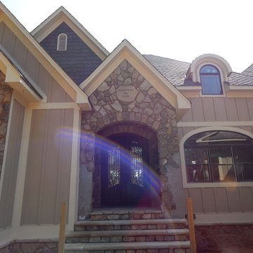 Iron Entry door with engraved stone nameplate