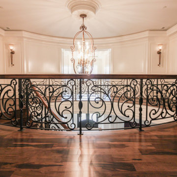 Project #74 | Circular Staircase with Hand-Forged Metal Panels