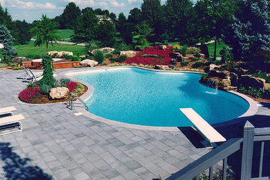 Island style pool photo in Newark