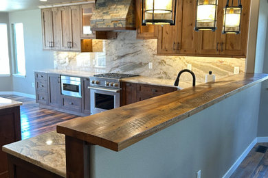 Mountain style kitchen photo in Denver