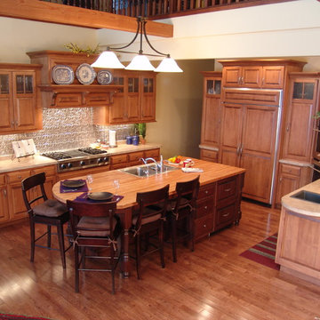 Maple Cabinets With Tin Backsplash