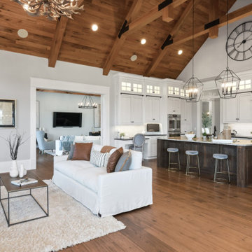 Modern Farmhouse Kitchen with Vaulted Wood-Beam Ceiling & Open-Concept Design