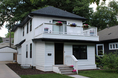 Inspiration for a small craftsman white two-story vinyl exterior home remodel in Minneapolis with a shingle roof