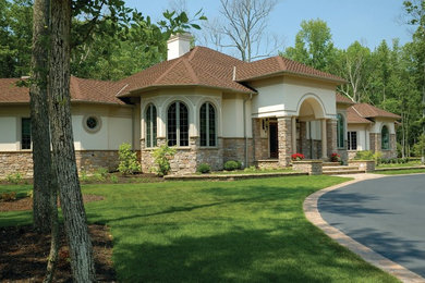 Example of a tuscan home design design in Philadelphia