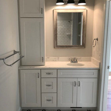 All white cabinetry for kitchen and bath