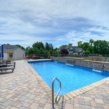 Traditional Pool with Retractable Cover