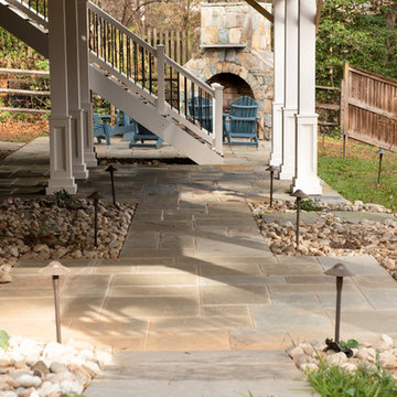 Outdoor Living Design: Welcoming Patio under a deck