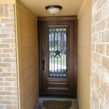 Wood Doors with Wrought Iron