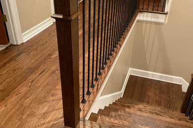 Inspiration for a mid-sized timeless medium tone wood floor and brown floor hallway remodel in Portland