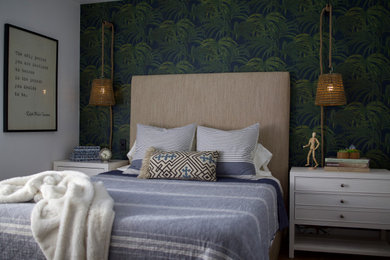 Beach style wallpaper bedroom photo in San Diego with multicolored walls