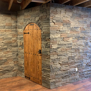 Kenai Stacked Stone Around a Rounded Doorway