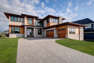 Example of a minimalist exterior home design in Calgary