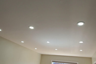 Family room - traditional family room idea in Toronto with gray walls