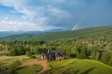 Example of a mountain style exterior home design in Charlotte