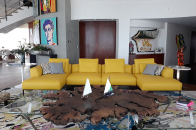 Huge eclectic open concept dark wood floor living room photo in Miami