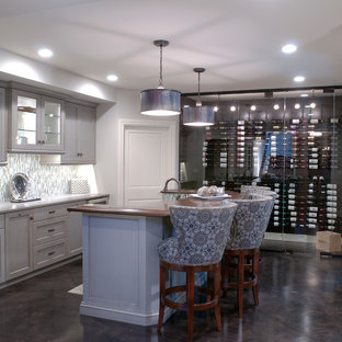Photo of a mediterranean home bar in Grand Rapids.