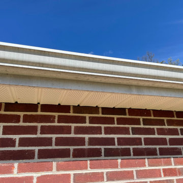Deck stain and gutters power wash