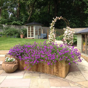 Country garden in Hampshire with with raised garden bed.