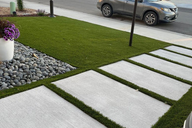 Concrete paver porch photo in Denver