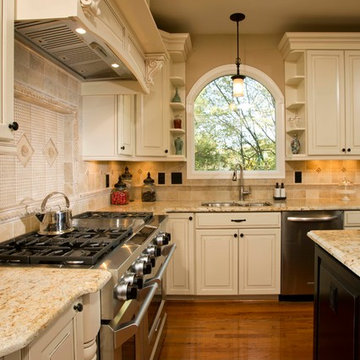 Custom Cabinets, Arched Windows and Doors Provide This Kitchen Its Character