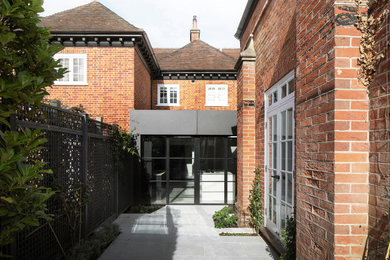 This is an example of a mid-sized contemporary exterior in Hampshire.