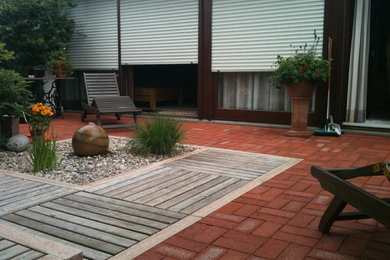 Inspiration for a traditional deck in Munich with a water feature.
