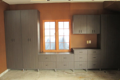 Garage, cabinetry and drawers built around window