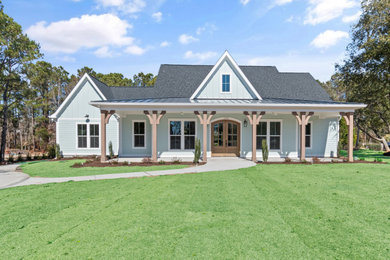 Example of a beach style exterior home design in Other