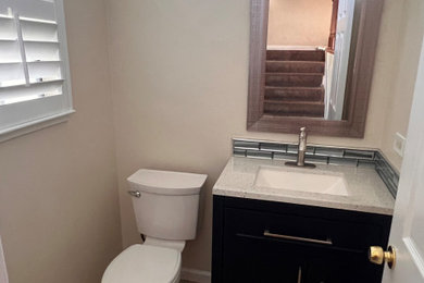 Inspiration for a timeless powder room remodel in Sacramento