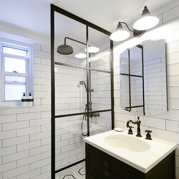 E 56th- Black & White Bathroom Remodel- Shower and Sink View