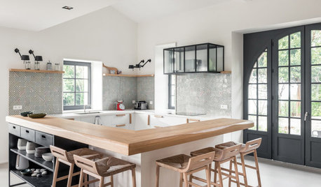 Îlot ou bar, que choisir pour la cuisine ?