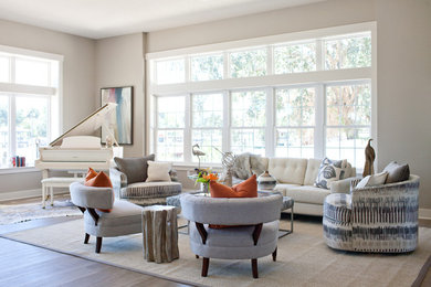 Living room - large coastal open concept vinyl floor and gray floor living room idea in Orlando with gray walls