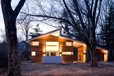 Inspiration for a mid-sized contemporary two-story wood exterior home remodel in Boston