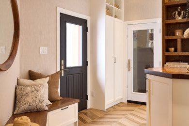 Entryway - mid-sized transitional porcelain tile, brown floor, tray ceiling and wallpaper entryway idea in Ottawa with multicolored walls and a black front door