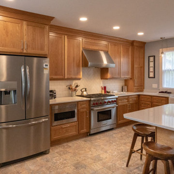 Transitional Warm Wood Farmhouse Kitchen Remodel | Quartz Countertops & Modern L