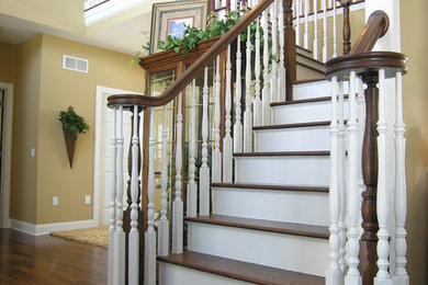 Staircase - mid-sized wooden l-shaped wood railing staircase idea in Philadelphia with wooden risers