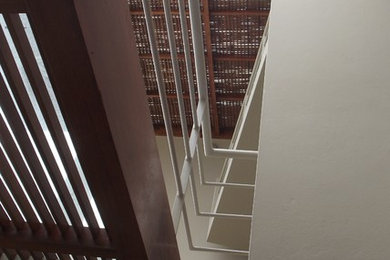 Trendy staircase photo in Other