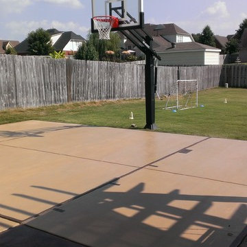 Bruce J's Pro Dunk Silver Basketball System on a 25x25 in Lakeland, TN