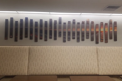Example of a huge beach style vinyl floor and wainscoting great room design in San Diego