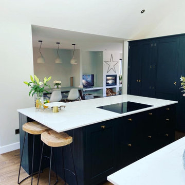 Large handmade kitchen with kitchen island and full length larder
