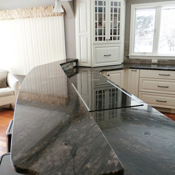Traditional White Kitchen Remodel with Cook top in the peninsula