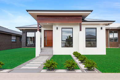 Design ideas for a modern exterior in Canberra - Queanbeyan.