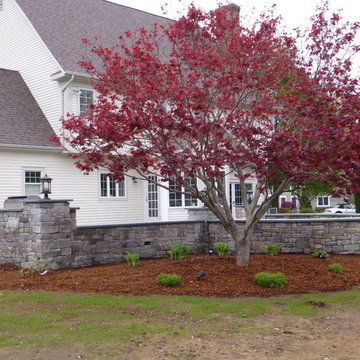 Bluestone Patio with Granite Cobblestone walls