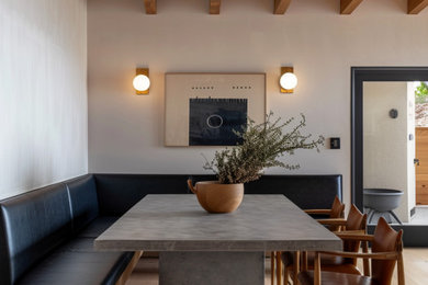 Inspiration for a large modern light wood floor and exposed beam kitchen/dining room combo remodel in Phoenix with white walls