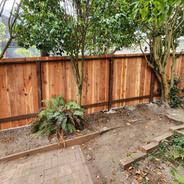 Redwood fence installation